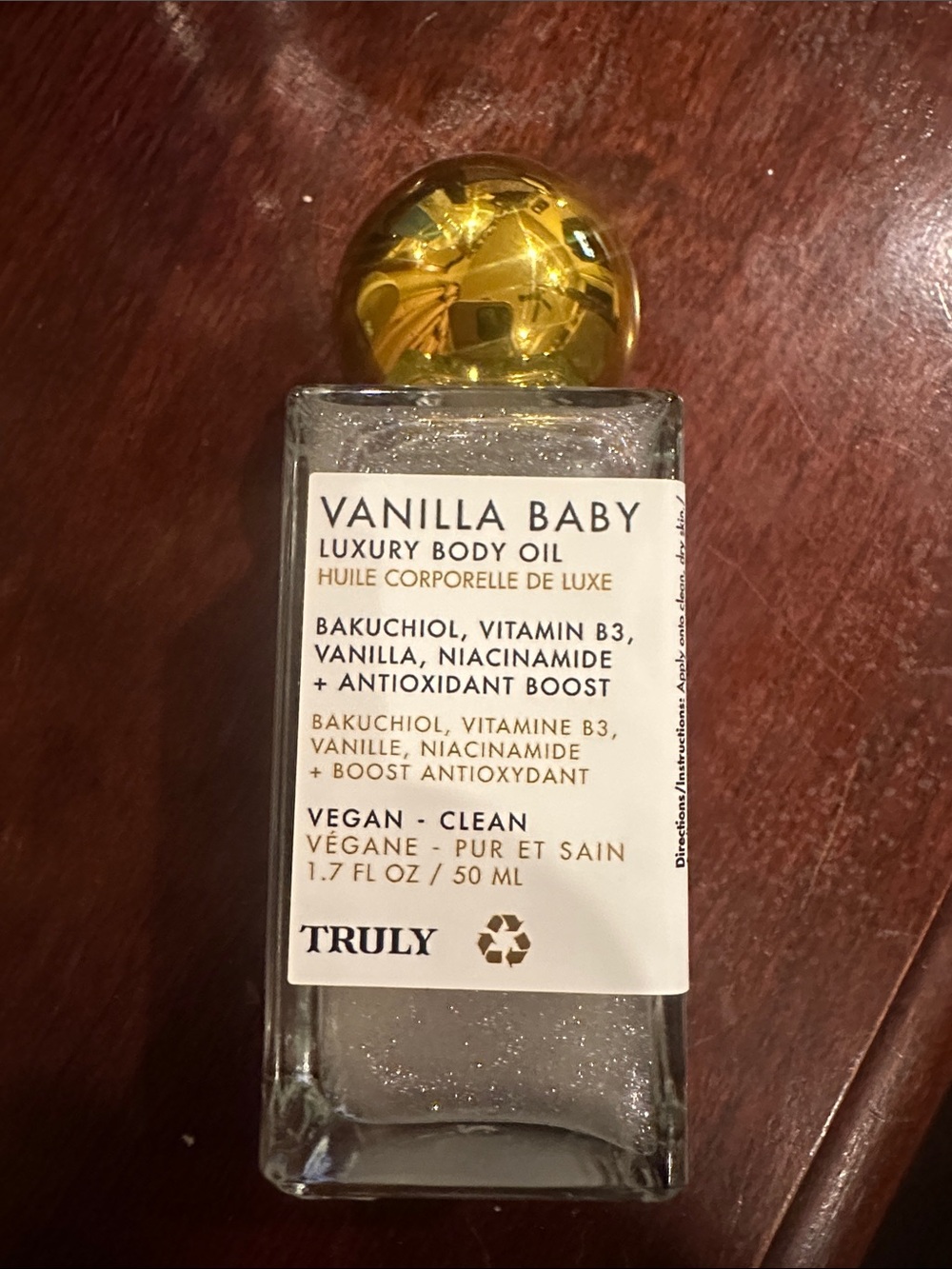 TRULY Vanilla Baby Luxury Body Oil — Clear Bottle with Gold Cap